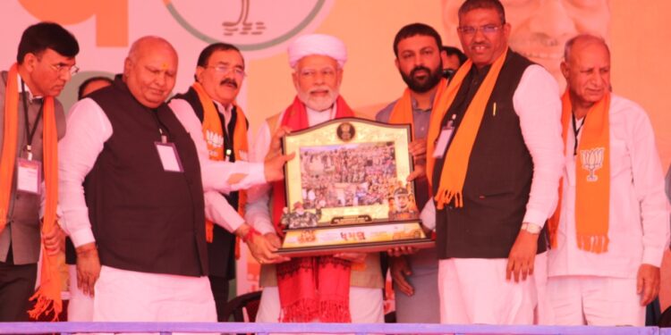 Upcoming Dhaman Gujarati movie’s producer Bhupat Bodar presents memento to PM Modi behalf of his Dhaman team